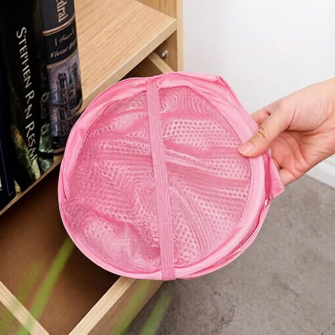 The upgraded pop-up laundry basket features a breathable side pocket mesh design