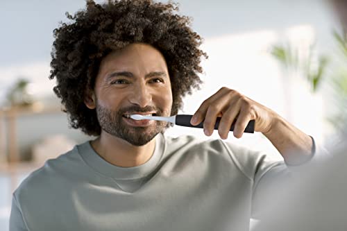 Philips Sonicare 4100 Rechargeable Electric Toothbrush, with Pressure Sensor, 2 Intensity Settings, SmarTimer and QuadPacer, 14-Day Battery Life, Deep Pink, Model HX3681/26