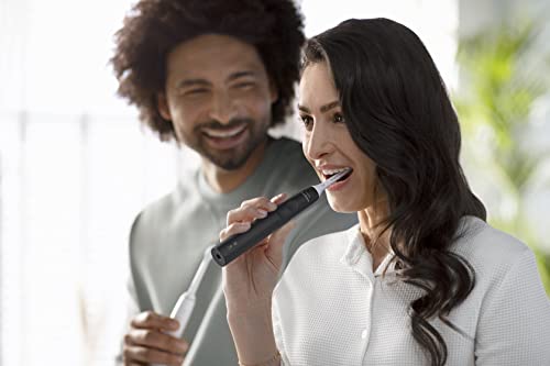 Philips Sonicare 4100 Rechargeable Electric Toothbrush, with Pressure Sensor, 2 Intensity Settings, SmarTimer and QuadPacer, 14-Day Battery Life, Deep Pink, Model HX3681/26