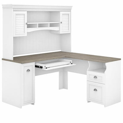 Hutch includes closed storage with framed louvered doors, three work-in-process cubby shelves and large center shelf