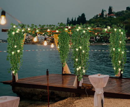 RECUTMS Fake Vines 12 Pack 86 FT Artificial Ivy with 100 LED String Light Leaves Wall Leaf Plants Greenery Garland Hanging Plant Vine for Room Garden Office Wedding Decor