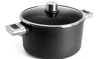 Woll ECO LOGIC PRO 8-Pc Cookware Set: 9.5" & 11" fry pans, 11" sauté pan, 7" saucepan, 9.5" stockpot + 3" lids. Made in Germany, Cast aluminum, Stainless Steel Handles, PFAS-free Diamond QXR nonstick.