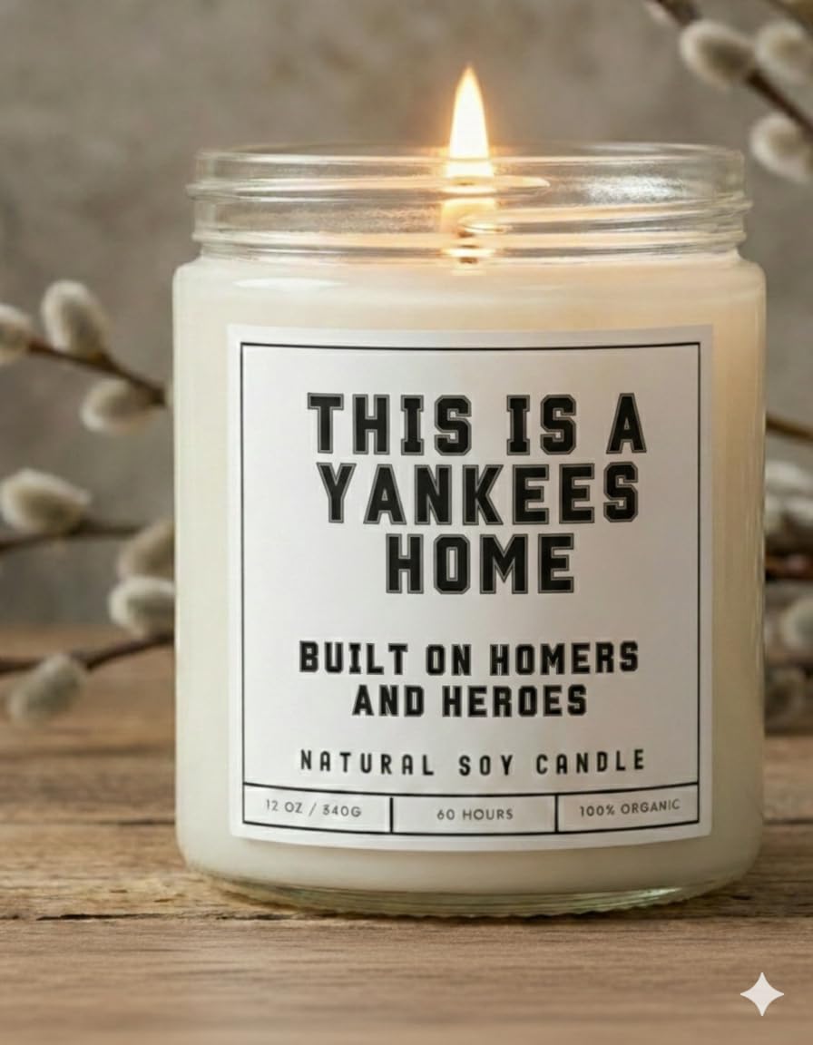 This is a Yankees Home - Built on Homers and Heroes Candle - Scented Soy Wax Candle (8.0 oz) 50-60 Hour Burn Time, Cotton Wick, Frosted White Glass Jar