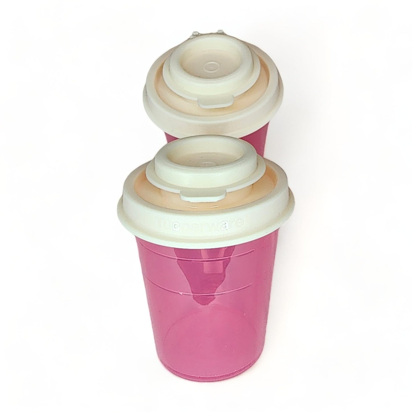 Tupperware Mini Salt and Pepper Shakers 2 oz Pink with Cream Lids
