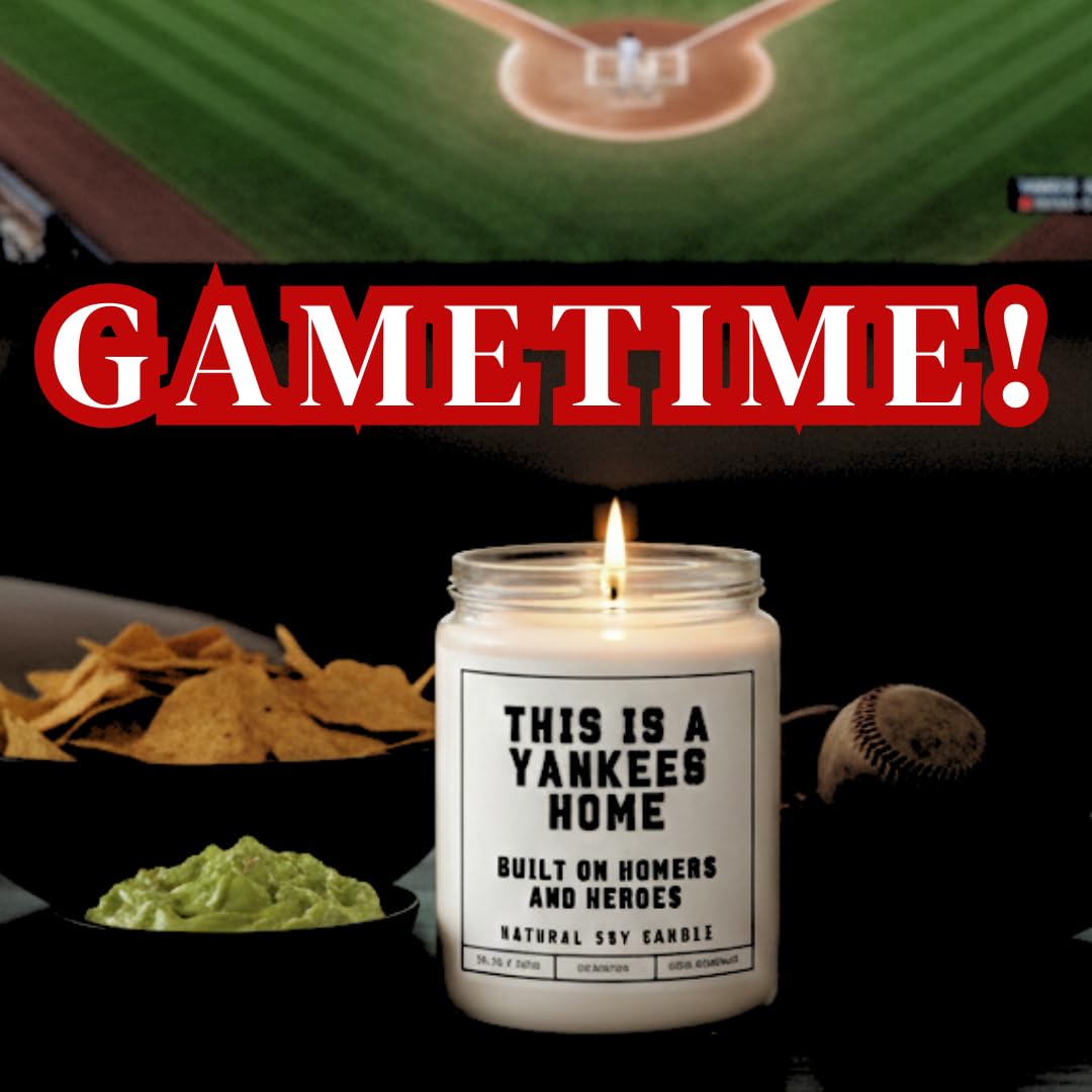 This is a Yankees Home - Built on Homers and Heroes Candle - Scented Soy Wax Candle (8.0 oz) 50-60 Hour Burn Time, Cotton Wick, Frosted White Glass Jar