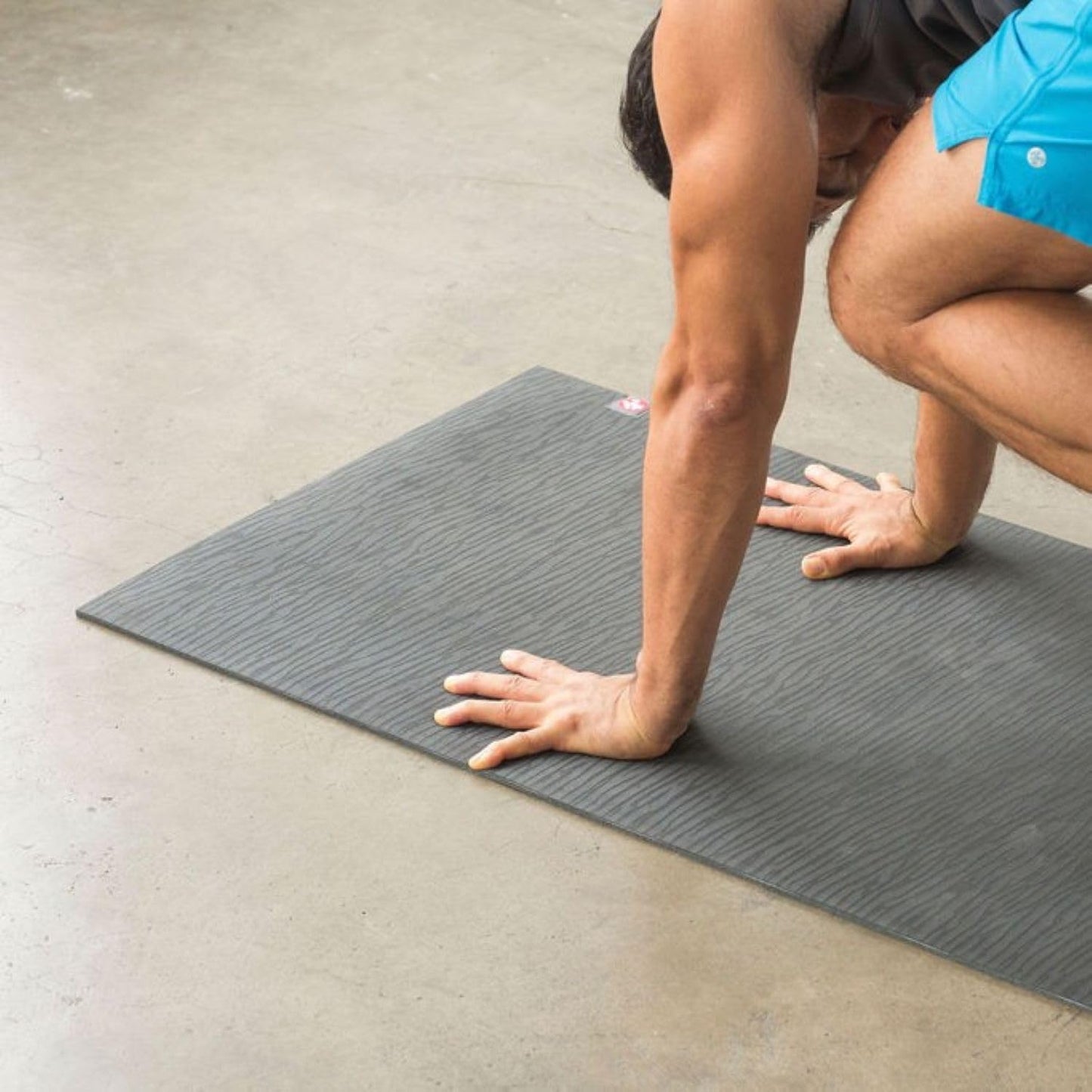 Manduka eKO Superlite Yoga Mat for Travel - Lightweight, Easy to Roll and Fold, Durable, Non Slip Grip, 1.5mm Thick, Charcoal Grey, 71" x 24"