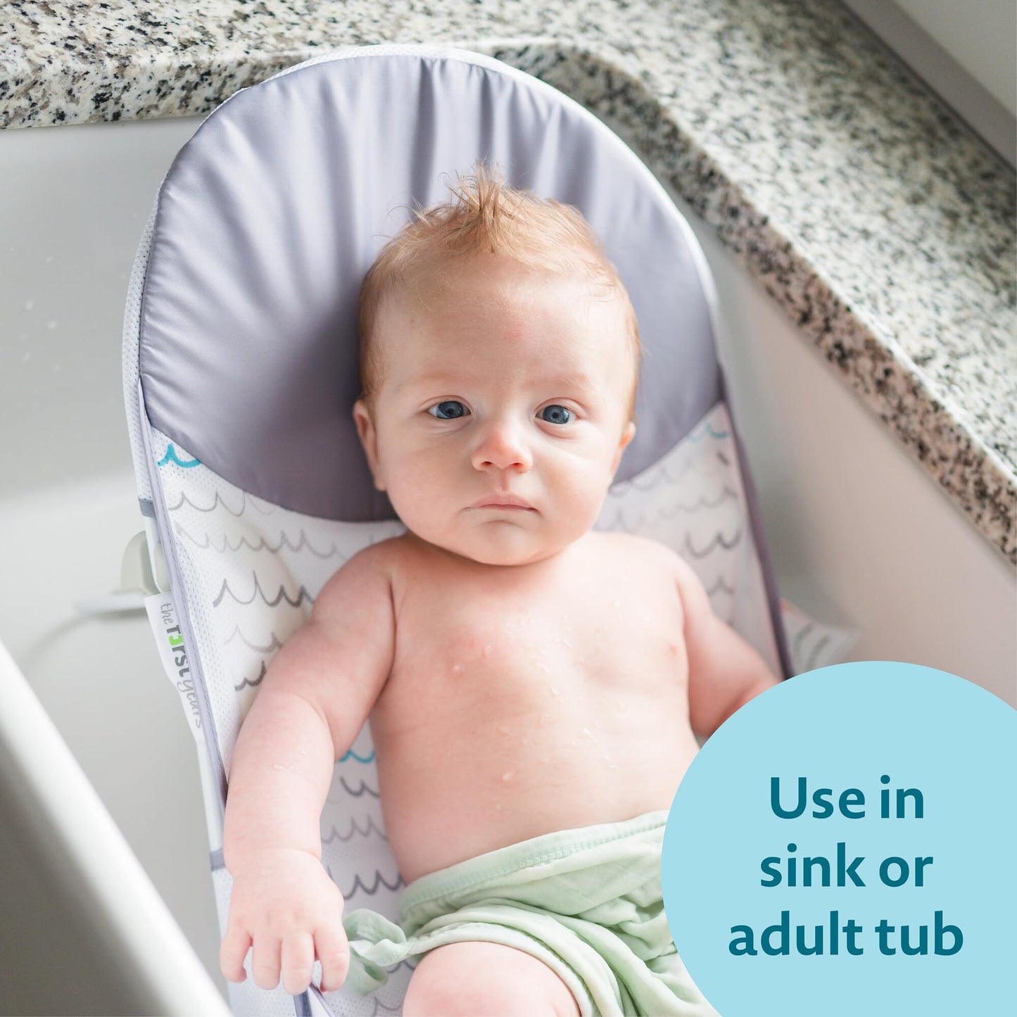 The First Years Sure Comfort Folding Baby Bather - Baby to Toddler Bath Tub - No-Slip Seat - for Sink or Tub Use