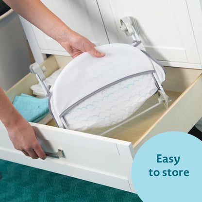 The First Years Sure Comfort Folding Baby Bather - Baby to Toddler Bath Tub - No-Slip Seat - for Sink or Tub Use
