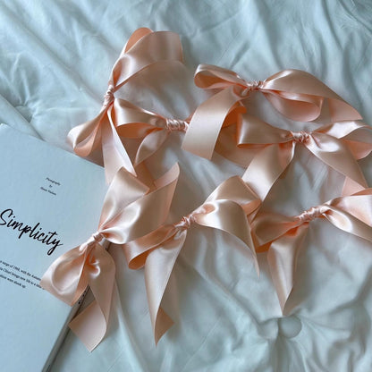 Eanjia Peach Bow Garland Pre-Assembled | 6ft Silk Satin Bow Banner for Coquette Bachelorette Party, Soft Blush Baby Shower,Bridal Shower Wedding Baby Room Bed Decor (Peach, 6ft)