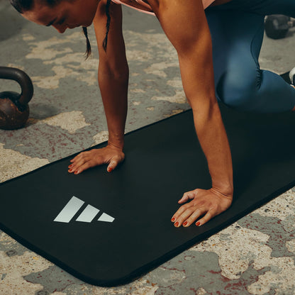 adidas 10mm Extra Thick Training Mat with Carrying Strap and Non-Slip Textured Base - Cushioned Workout Mat for Home Gym, Floor Workouts, and Intense Exercises - Portable and Durable