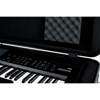 Gator Cases Frequent Flyer's Series Molded Flight Case for 76-Note Keyboards with TSA Approved Locking Latches and Recessed Wheels, (GTSA-KEY76)