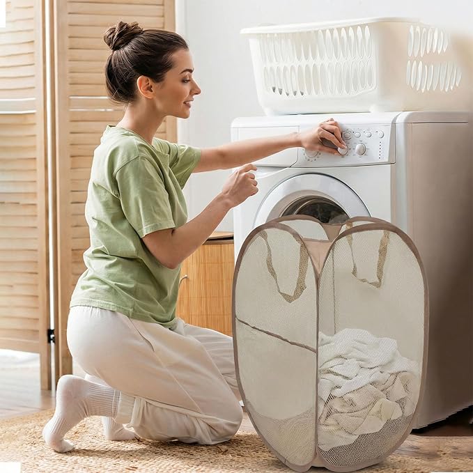 The upgraded pop-up laundry basket features a breathable side pocket mesh design