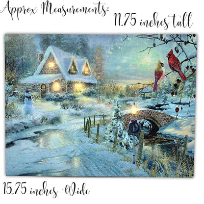 BANBERRY DESIGNS LED Christmas Wall Art - Lighted Cottage Along a Stream Christmas Scene with Cardinals and Snowman - LED Canvas Prints - Old Fashioned Cobblestone Bridge - Measures 11.75" x15.75"