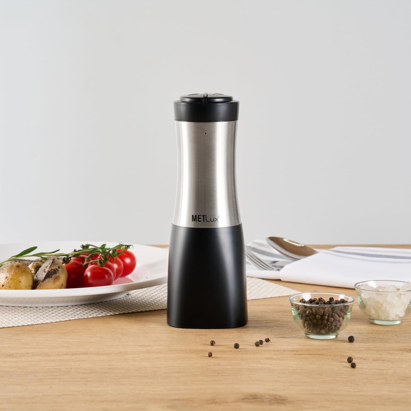 Restaurantware Electric Salt And Pepper Grinder Set 1 Case 2.8 x 2.8 x 7.9 Inch Stainless Steel Cordless Spice Mill With Adjustable Coarseness And LED Light Black Finish
