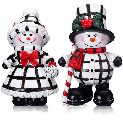 Moucuny 2 Pieces Winter Snowman Figurines Decorations Black and White Resin Snowman Winter Ornaments with Chef Hat Candy Bow Scarf Table Decor for Tabletop Office Shelf Gift Home Kitchen Mantle