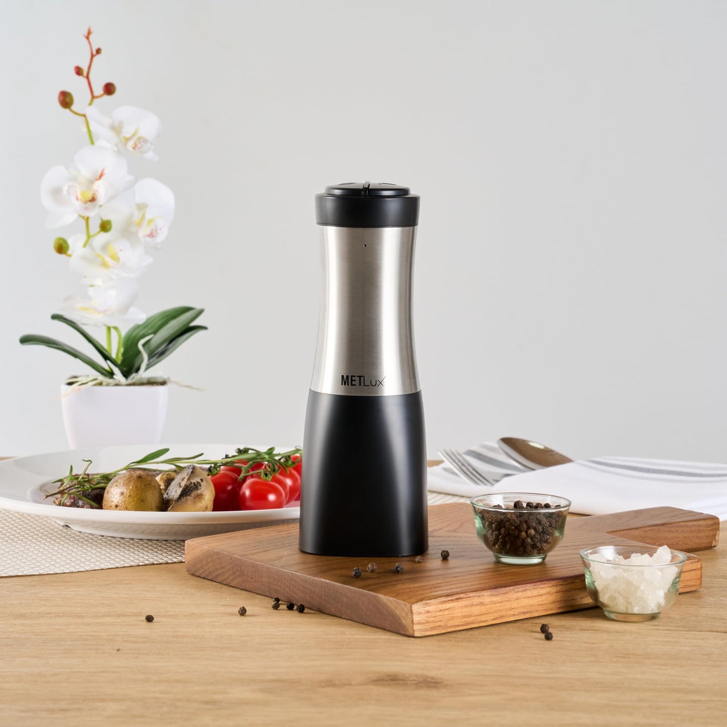 Restaurantware Electric Salt And Pepper Grinder Set 1 Case 2.8 x 2.8 x 7.9 Inch Stainless Steel Cordless Spice Mill With Adjustable Coarseness And LED Light Black Finish