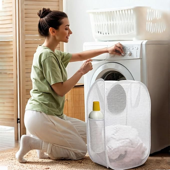 The upgraded pop-up laundry basket features a breathable side pocket mesh design