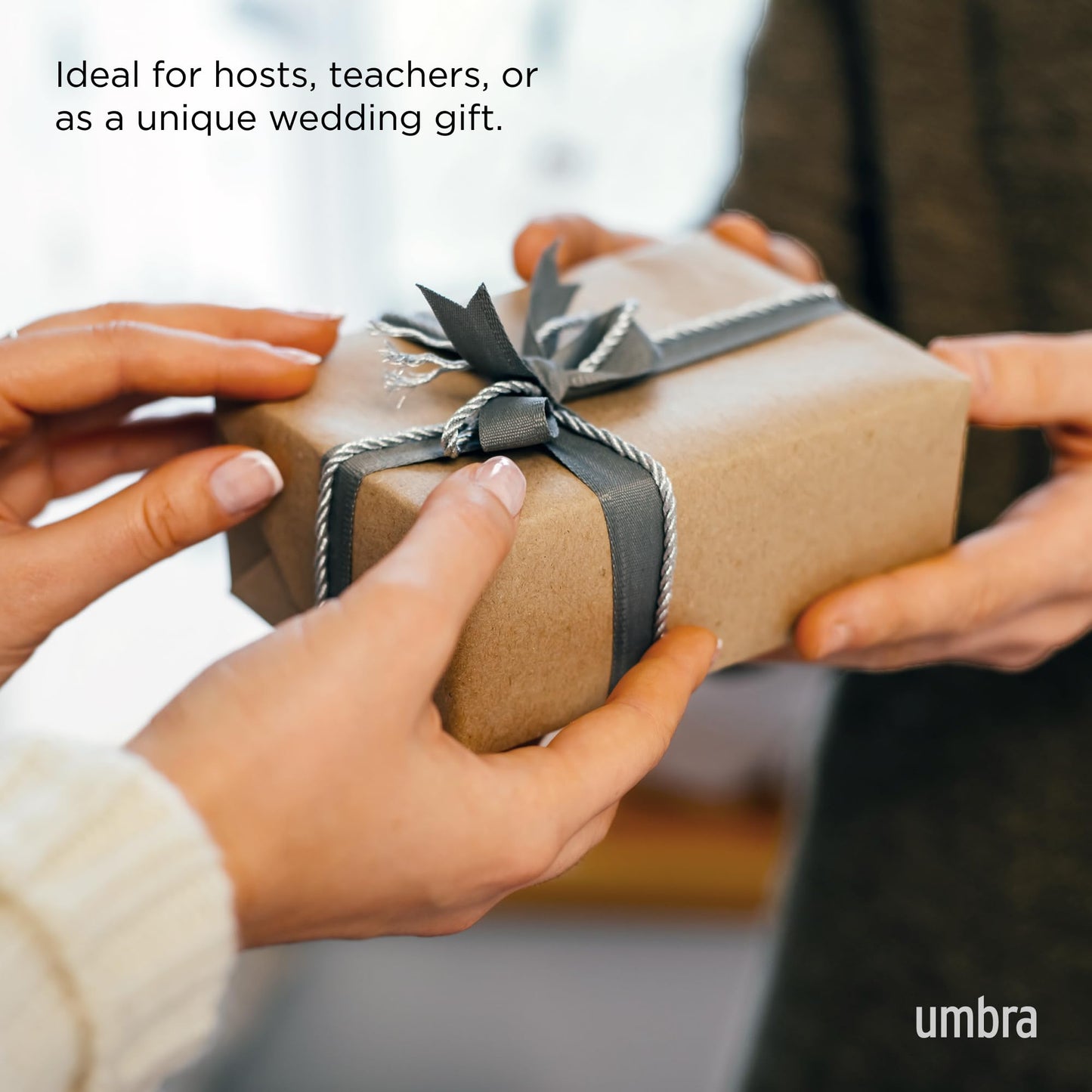Umbra Isa Bell - Decorative Modern Dinner Bell, Chrome Hand Bell for Home or Office