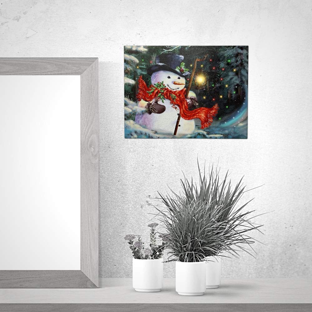 BANBERRY DESIGNS LED Wall Art - Lighted Snowman Canvas Print - Christmas Wall Hanging Snowman with a Red Scarf Holding a Lantern - Winter Holiday Scene 11.75" H x 15.75" W
