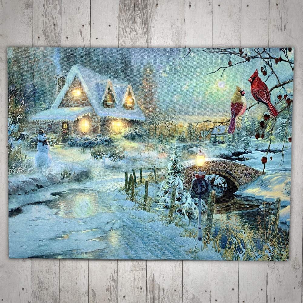 BANBERRY DESIGNS LED Christmas Wall Art - Lighted Cottage Along a Stream Christmas Scene with Cardinals and Snowman - LED Canvas Prints - Old Fashioned Cobblestone Bridge - Measures 11.75" x15.75"