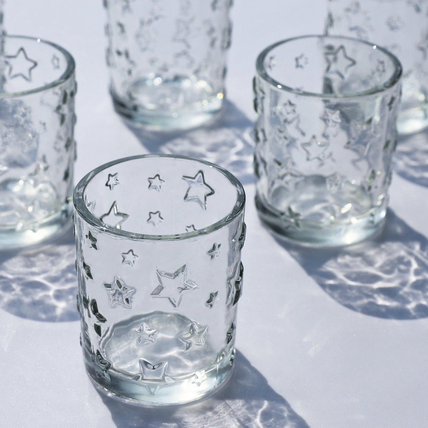 VOHO Votive Candle Holders Bulk Sparkle Stars Design for Centerpiece Table Decorations, Clear Tea Lights Candle Holder Set of 12 for Christmas Themed Party, Baby Shower, Wedding