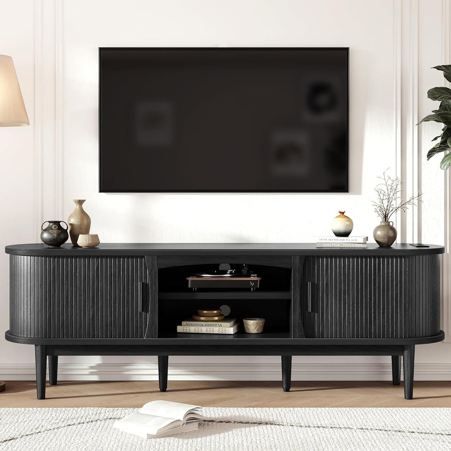 Decofy Mid Century TV Stand for TVs up to 70 Inches, Entertainment Center with Storage, Power Outlet, Fluted Sliding Doors & Adjustable Shelves, Modern Media TV Console Table for Living Room (Black)