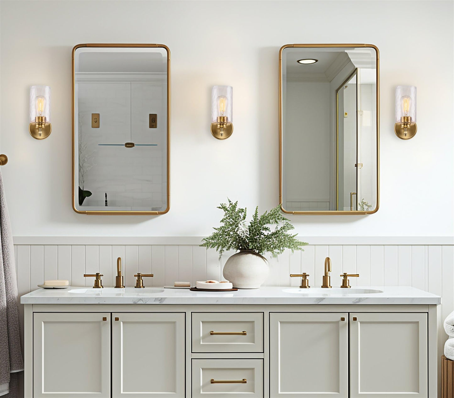 Kira Home Phoebe 10" Modern Gold Wall Sconce with Hammered Glass Shade, Gold Wall Light with Water Glass Cylinder Shade, Cool Brass Finish