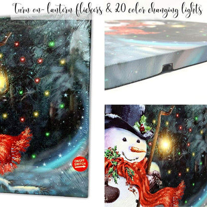 BANBERRY DESIGNS LED Wall Art - Lighted Snowman Canvas Print - Christmas Wall Hanging Snowman with a Red Scarf Holding a Lantern - Winter Holiday Scene 11.75" H x 15.75" W