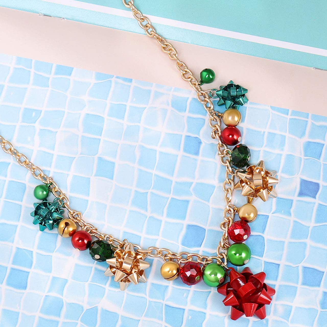 XOCARTIGE Christmas Necklace X-Mas Jingle Bell Necklaces Festive Bow Pendant Necklace Present for Women (A Gold)