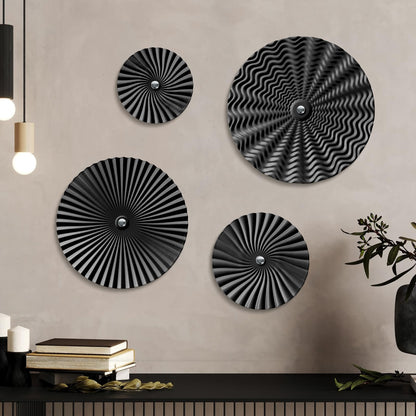 Putuo Decor 12" Black Starburst Wall Art Set of 4, Round Ripple Metal Sculptures in Varying Sizes, 3D Iron Hanging Panels for Modern Living Room Bedroom Office Industrial Interiors