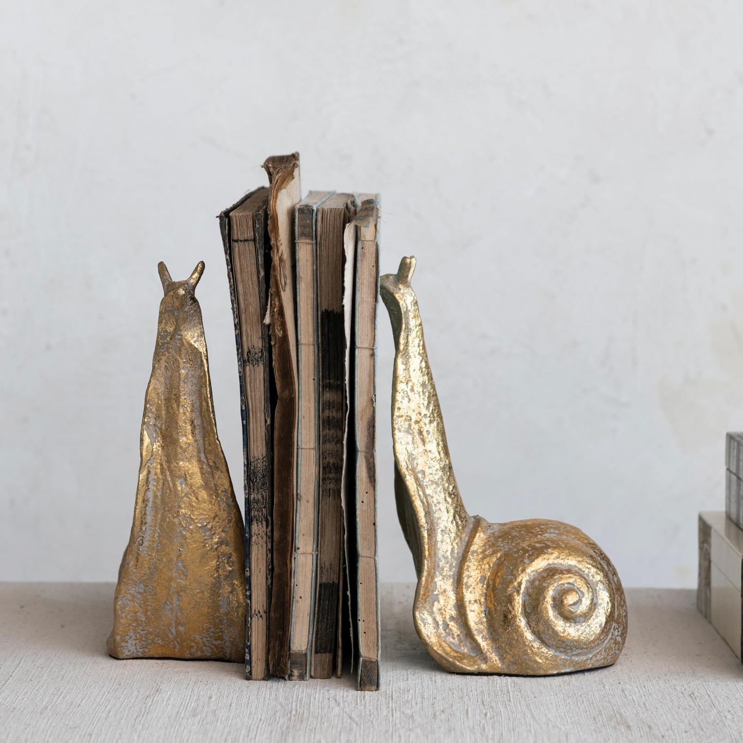 Creative Co-Op Decorative Distressed Cast Metal Snail Bookends, Gold