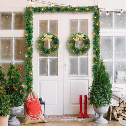 Ouddy Decor Christmas Garland with Lights, 19.7 Ft 60 Led Pre-lit Christmas Greenery Garland Battery Operated for Mantle Stairs Railing Party Winter New Year Outdoor Indoor Home Decor, Warm White