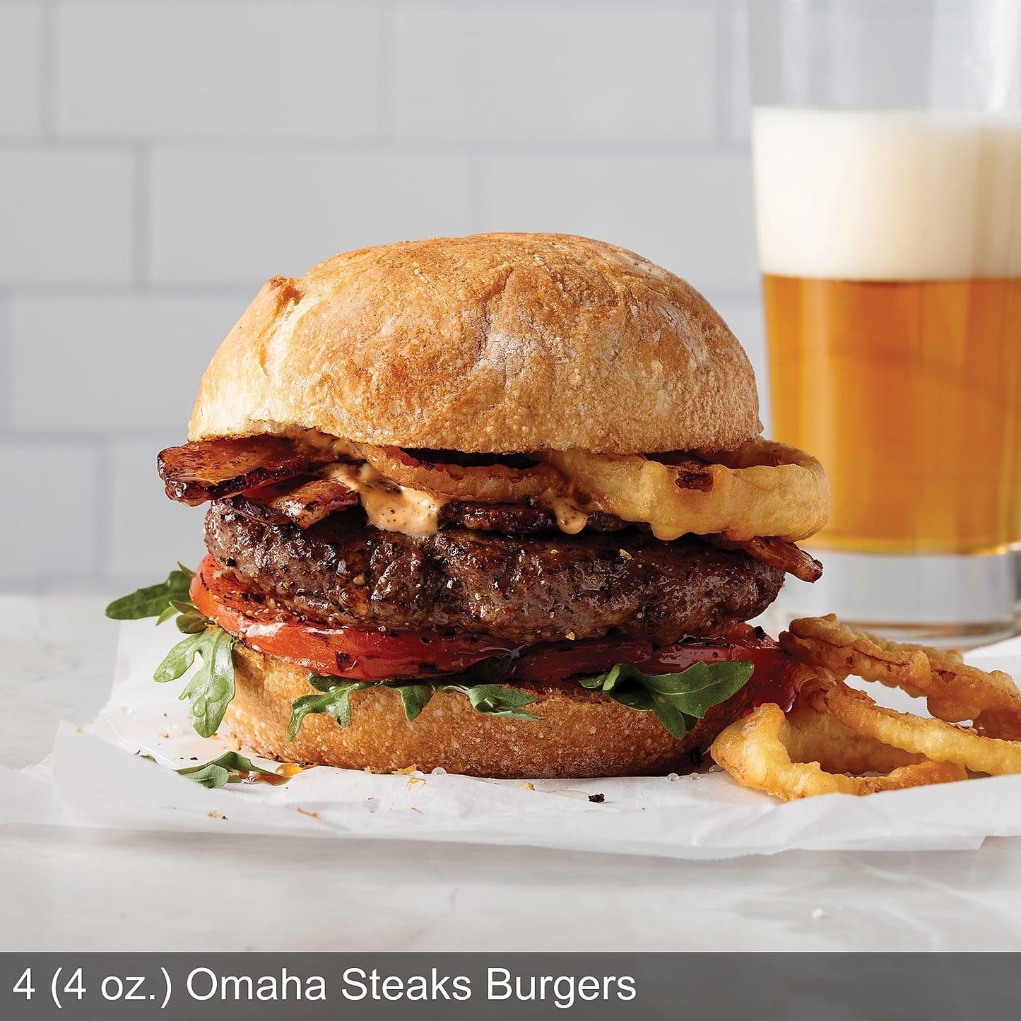 Omaha Steaks Deluxe Gift Package (4 Bacon-Wrapped Filet Mignons, 4 Steak Burgers, 4 Gourmet Jumbo Franks, 4 Au Gratin Potatoes, 4 Caramel Apple Tartlets, 1 jar Omaha Steaks Seasoning)