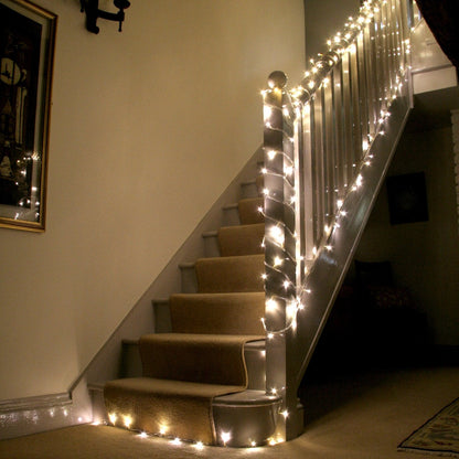 Lights4fun 8m String Lights 100 LED Warm White Fairy Lights Clear Cable with Rocker Switch Plug in Mains Powered Remote Control and Timer Indoor Bedroom Party Wedding Decoration