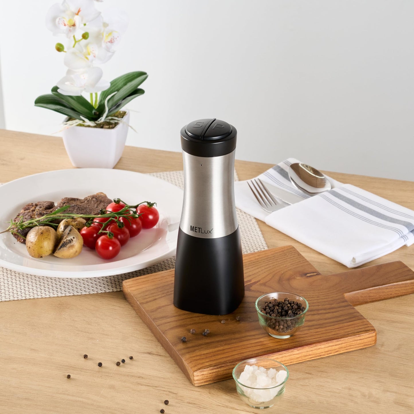 Restaurantware Electric Salt And Pepper Grinder Set 1 Case 2.8 x 2.8 x 7.9 Inch Stainless Steel Cordless Spice Mill With Adjustable Coarseness And LED Light Black Finish
