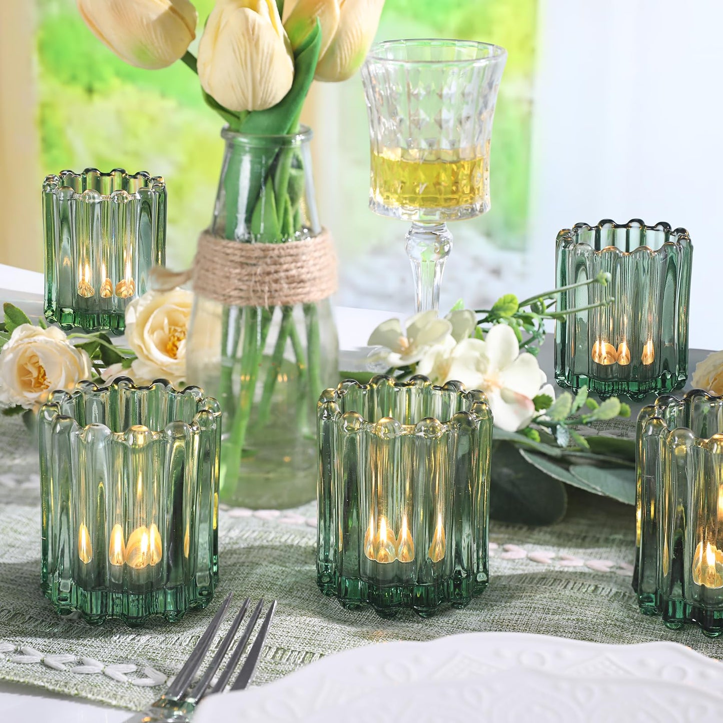 HAVITI Glass Green Votive Candle Holder, Ribbed Votive Candle Holders Set of 12, Tealight Candle Holder for Wedding Centerpieces Dinner Party Table Decor