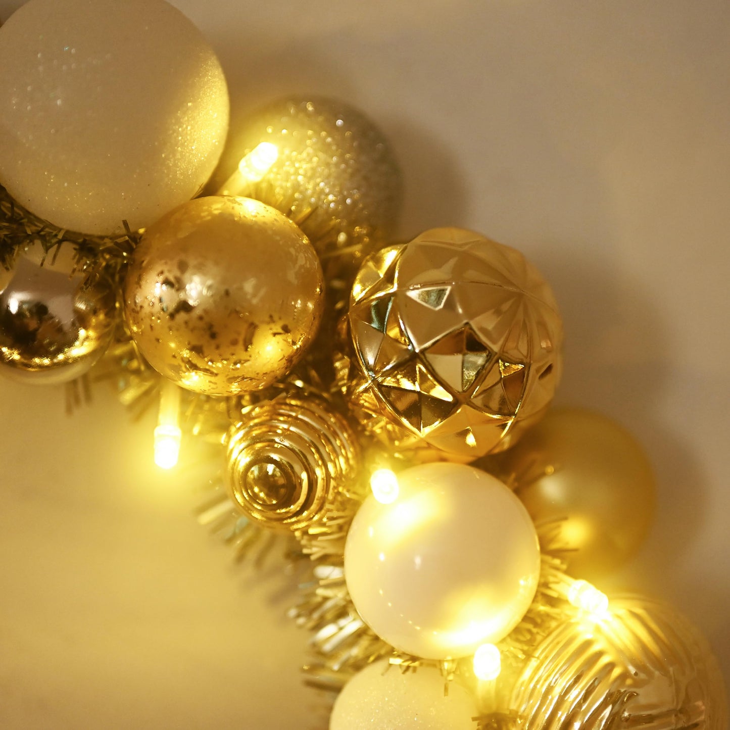 Valery Madelyn Pre-Lit Christmas Ball Wreath for Front Door with Lights, 13'' Lighted Battery Operates Christmas Door Wreath with White Gold Xmas Balls for Home Fireplace Window Table Indoor Decor