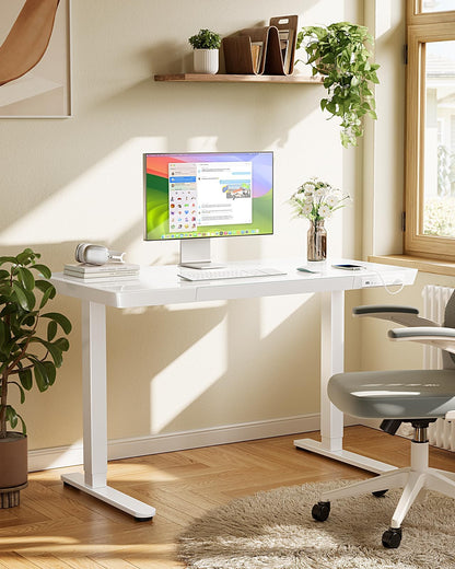 Marsail Glass Standing Desk with Drawer, 48 x 24 inch Electric Standing Desk, Height Adjustable Desk with One-Piece Tabletop & USB Charging Ports, Sit Stand Desk with Storage for Home & Office White