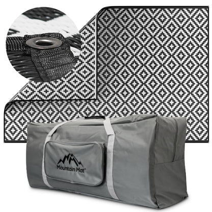 Mountain Mat Premium Plastic Outdoor Rug – Size 8' x 12' – Sand-Free Made from 100% Recycled Plastic – for Campsites, Tents, RVs, Campers, and Patios – with Durable Carry Bag and Grommets (Black)
