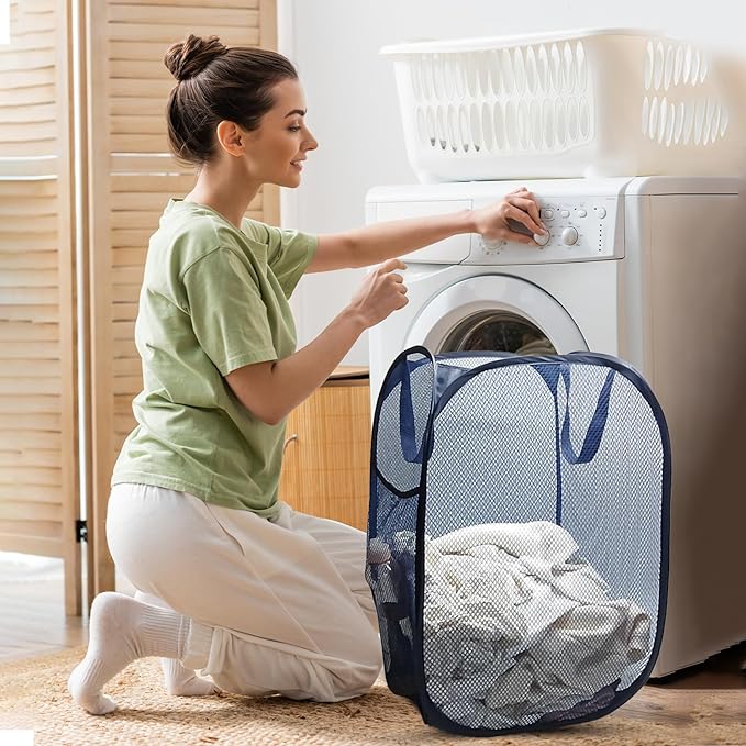 The upgraded pop-up laundry basket features a breathable side pocket mesh design
