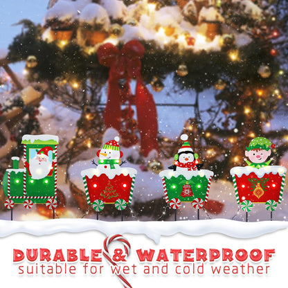 WONDER GARDEN Christmas Metal Yard Stakes, Lighted 4 Pack Christmas Garden Stakes Yard Signs, Outdoor Decorations Train with Santa, Snowman, Penguin, Boy for Lawn Party Outside