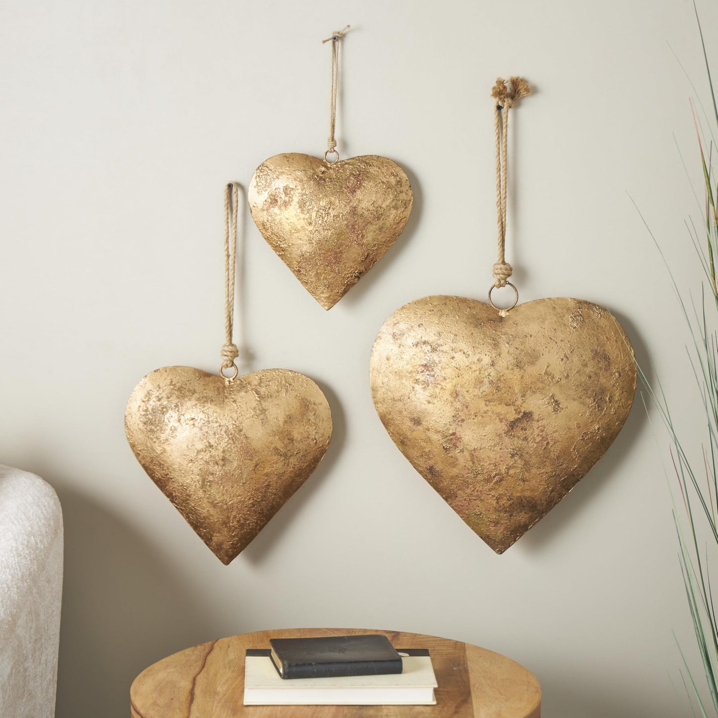 Deco 79 Metal Heart Decorative Bells Tibetan Inspired Weathered with Jute Hanging Rope, Set of 3 20", 17", 12"H, Gold