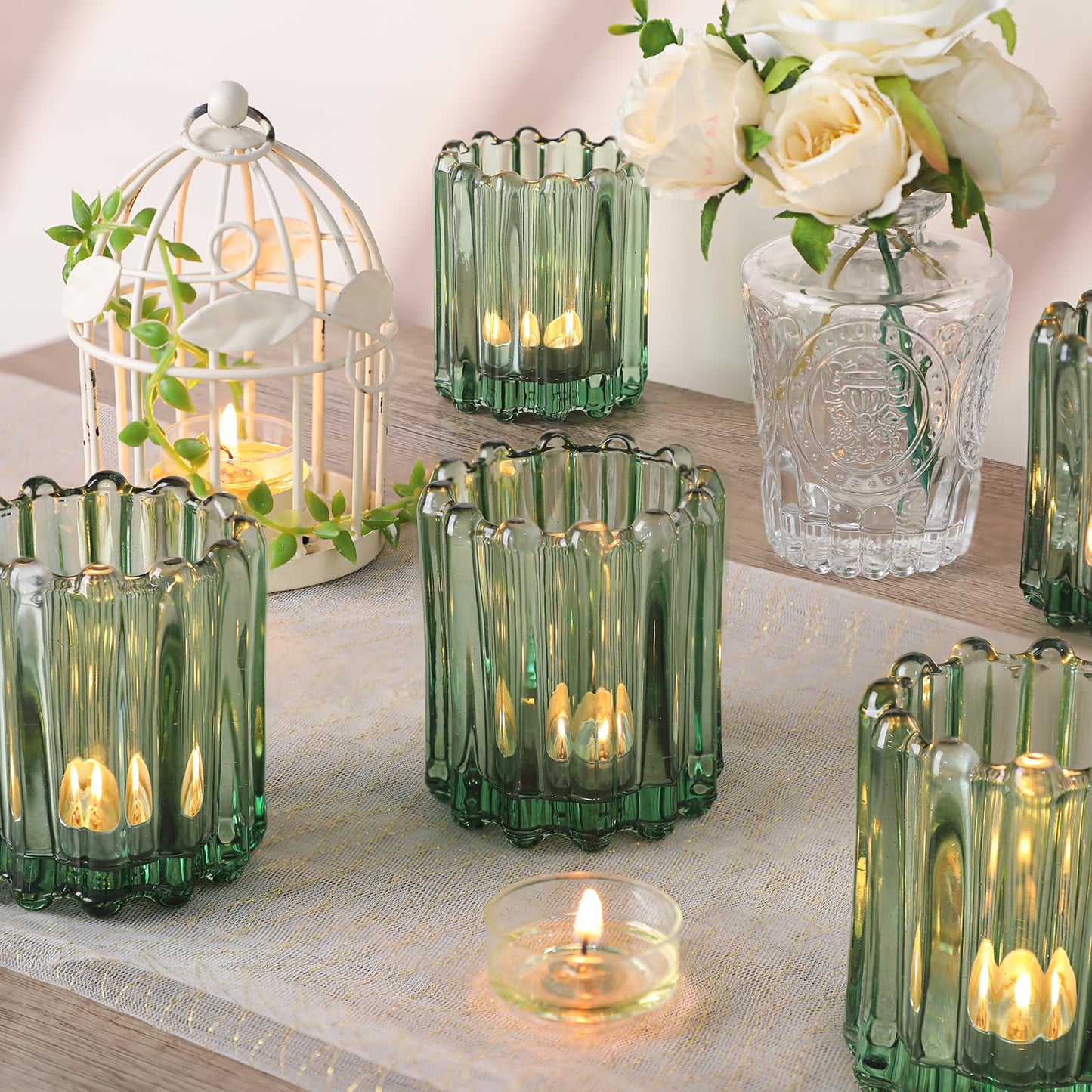 HAVITI Glass Green Votive Candle Holder, Ribbed Votive Candle Holders Set of 12, Tealight Candle Holder for Wedding Centerpieces Dinner Party Table Decor