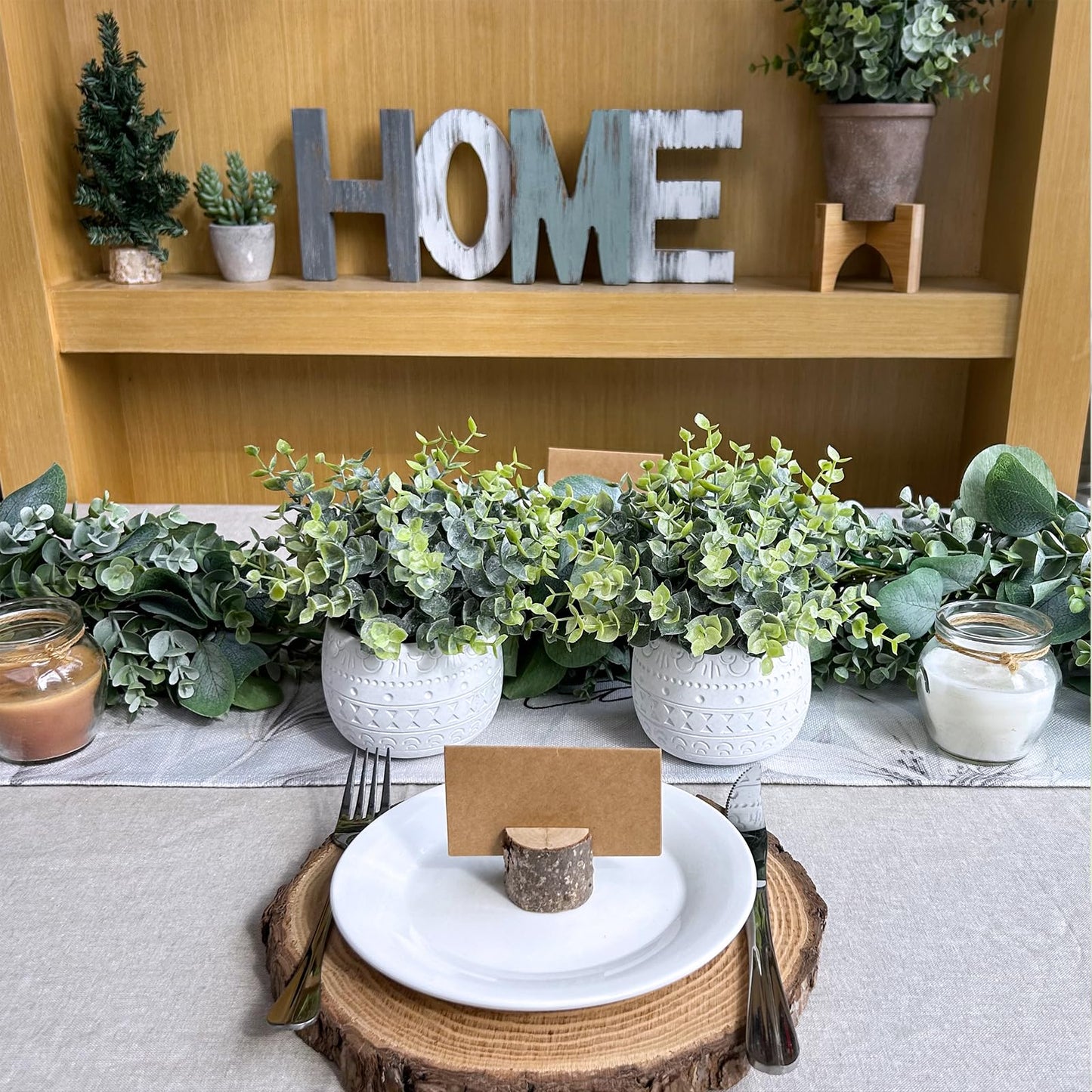 Winlyn Set of 2 Small Artificial Potted Plants Faux Eucalyptus Plant in White Geometric Ceramic Pots Small Desk Potted Plants 7.1" Tall for Home Office Room Decorations Wedding Greenery Centerpiece