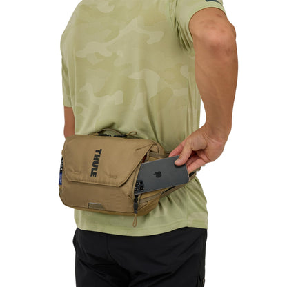 Thule Rail Hip Pack 4L - Soft Zippered Phone Pocket - 1.5L Water Bladder Included with Magnetic Hose Sleeve - External Elastic Nutrition Pockets - Inner Pockets for Organization