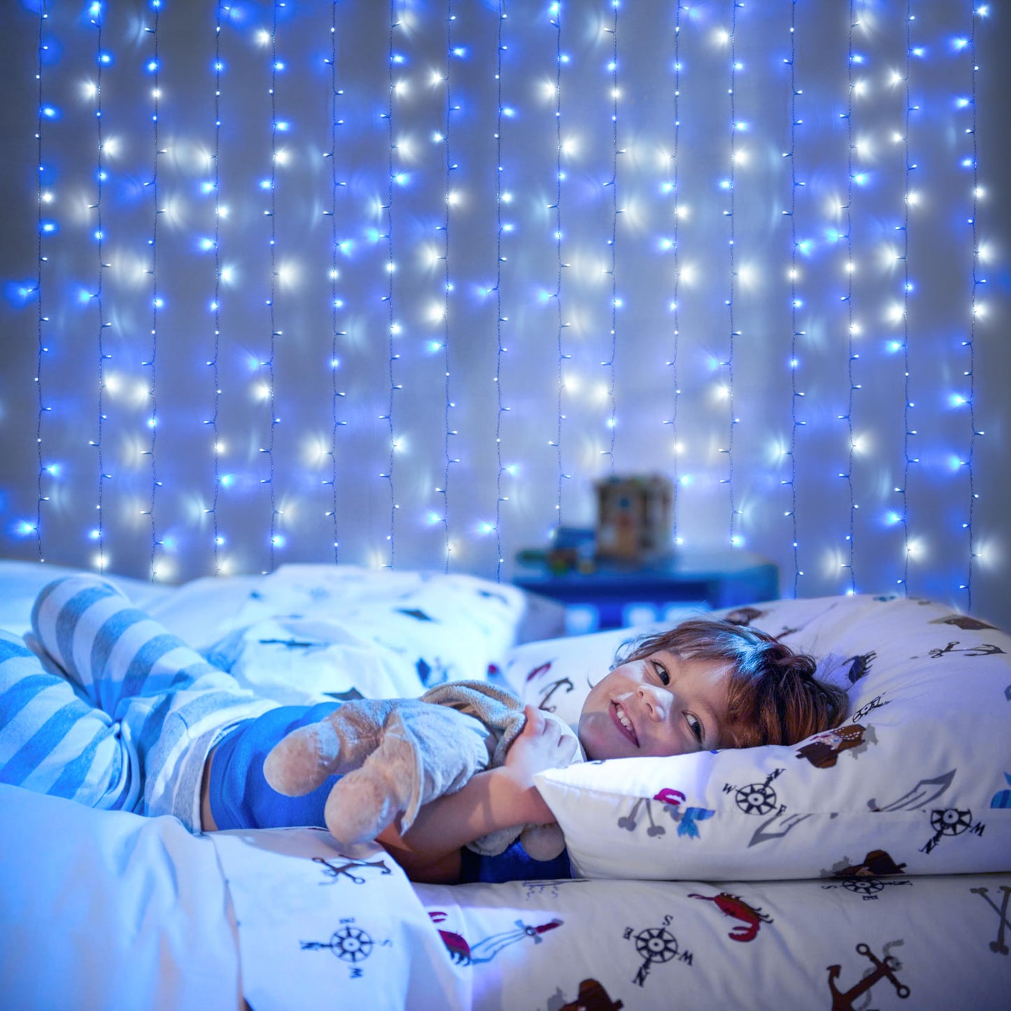 JMEXSUSS 300LED Christmas Curtain Lights Plug in with Remote, Blue and White Christmas Lights Indoor Outdoor, 8 Modes Hanging Fairy String Lights for Bedroom Window Wall Yard Patio Decor, 9.8x9.8ft