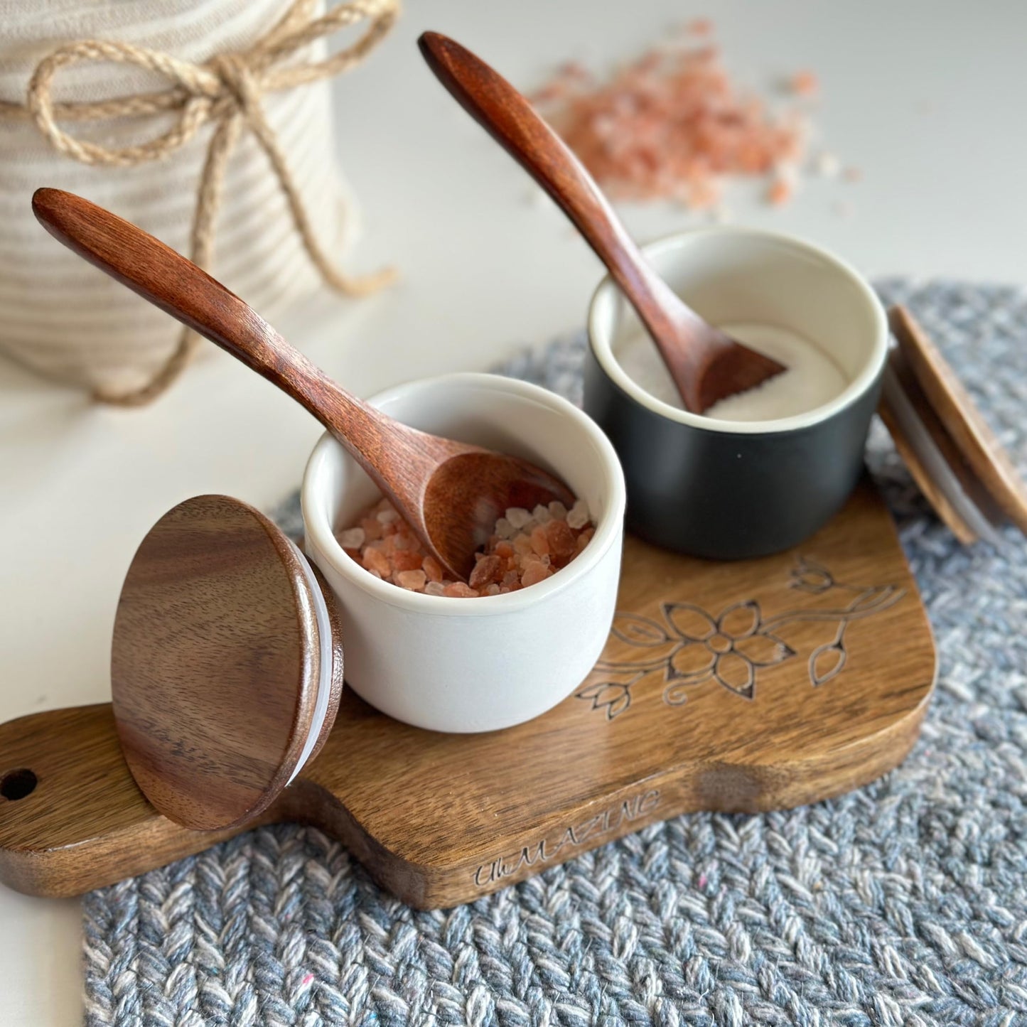 UhMAZING SALT AND PEPPER CELLAR SET WITH ACACIA WOOD LID AND ENGRAVED DECORATIVE HOLDING TRAY - WHITE AND BLACK