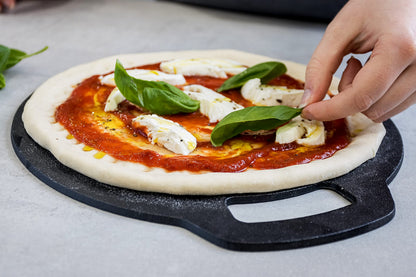 KitchenCraft Baking Stone Tray, Non Stick, for Oven or Hob, for Pizza, Bread, Pancake and other Recipes in Gift Box, Round, Cast Iron, 27 cm x 6.5 mm