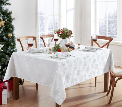 Newbridge Fancy Metallic Snowflake Christmas Fabric Tablecloth, 60 x 84 Inch Rectangle, White Silver, No-Iron Soil Resistant Sparkling Snowflakes Woven Holiday Table Cover