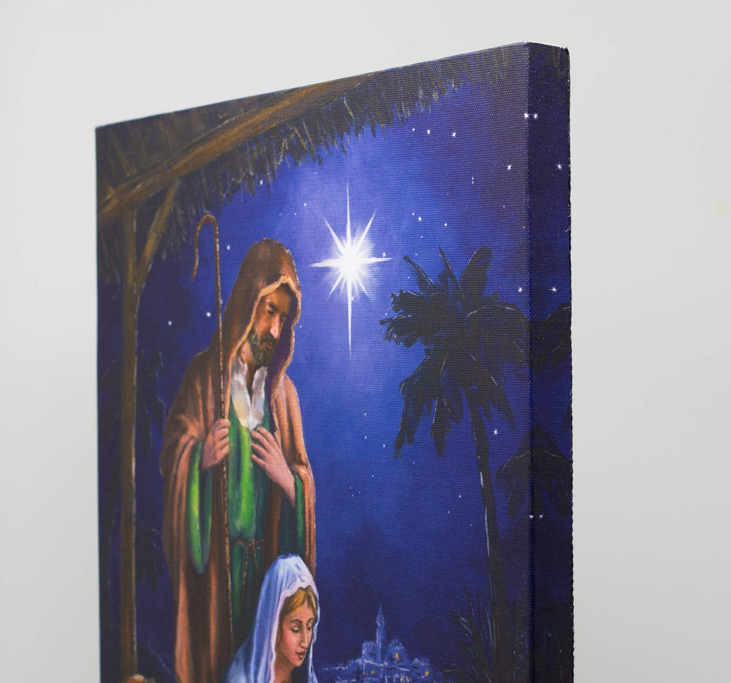 Nativity Lighted Canvas Wall Art - Light Up Holy Family Picture - LED - Mary Joseph and Baby Jesus in a Manger -Stable Scene - Measures 15.75" x 11.75"